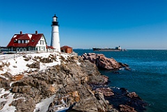 Portland Head Lighthouse Guides Ship to Harbor in Maine